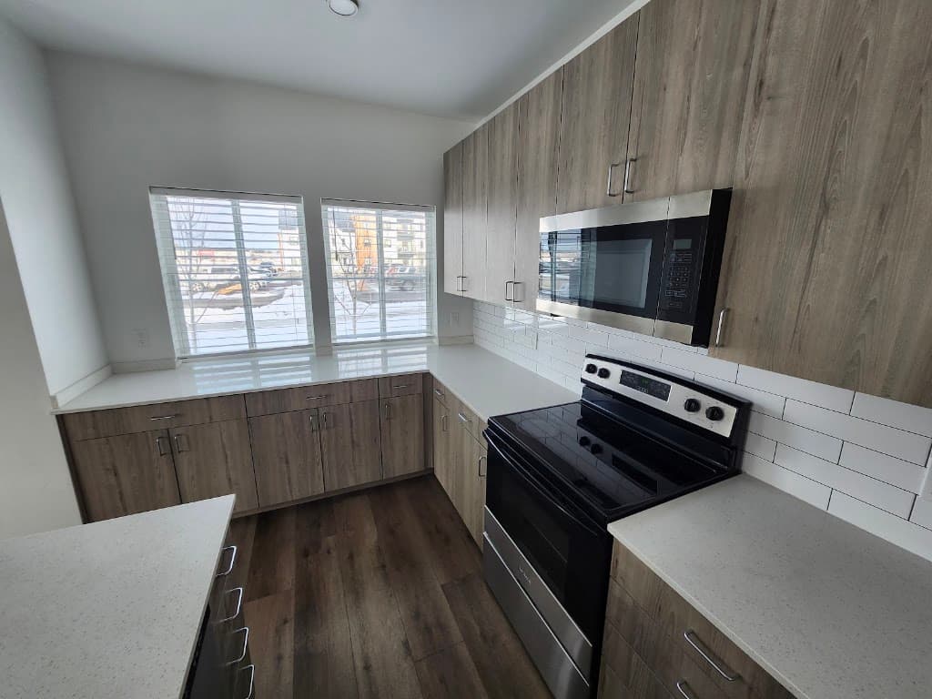 Bright, freshly cleaned vacant kitchen after a move-out cleaning